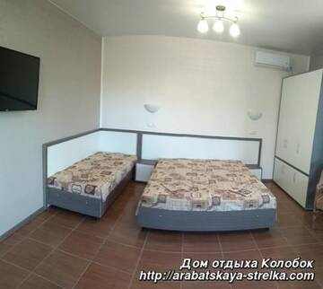 Фото номера Номер-студио с балконом Мини-отель Kolobok Guest House г. Геническ 4