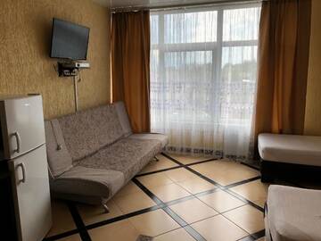 Фото номера Четырехместный номер &quot;Комфорт&quot; Отель Hotel Nariman г. Геническ 5